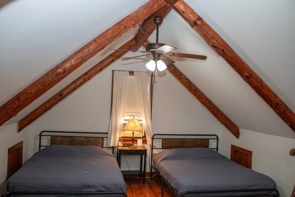 Loft bedroom with two queen beds. 