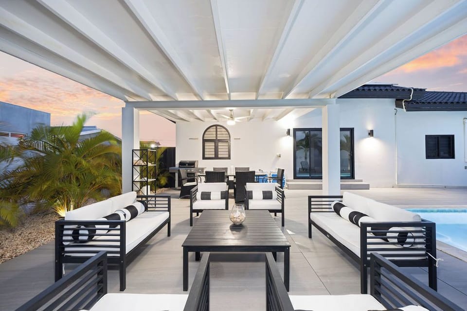 Indulge in luxury at our chic seating area. Your perfect escape awaits in elegance and comfort.