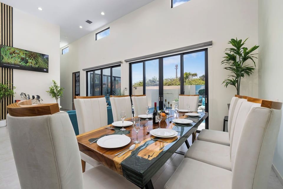 Gather around and make memories in the inviting dining area — perfect for shared meals, game nights, or simply enjoying good company.