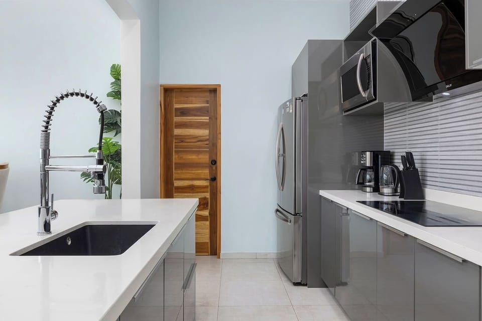 Cook up your favorite meals in our fully equipped kitchen — complete with modern appliances and everything you need for a comfortable stay!
