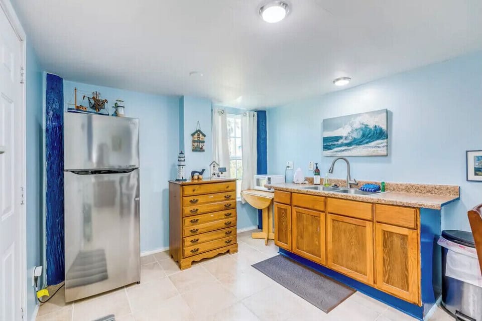 1st floor kitchenette with fridge and microwave.