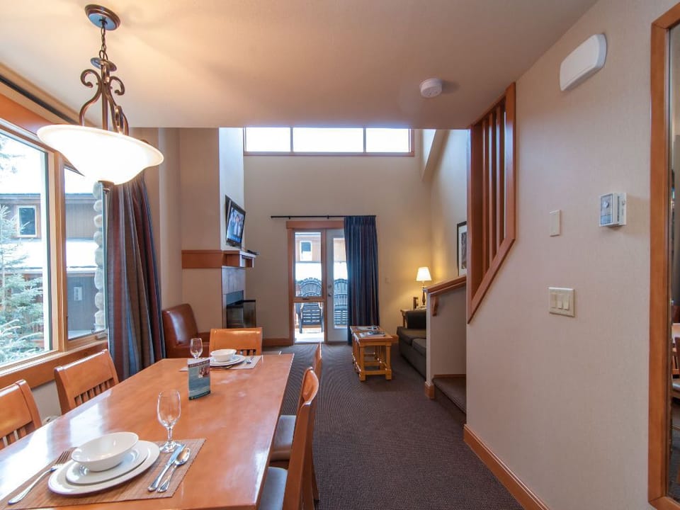 Enjoy meals in this bright and airy dining area, featuring a welcoming atmosphere and natural light.