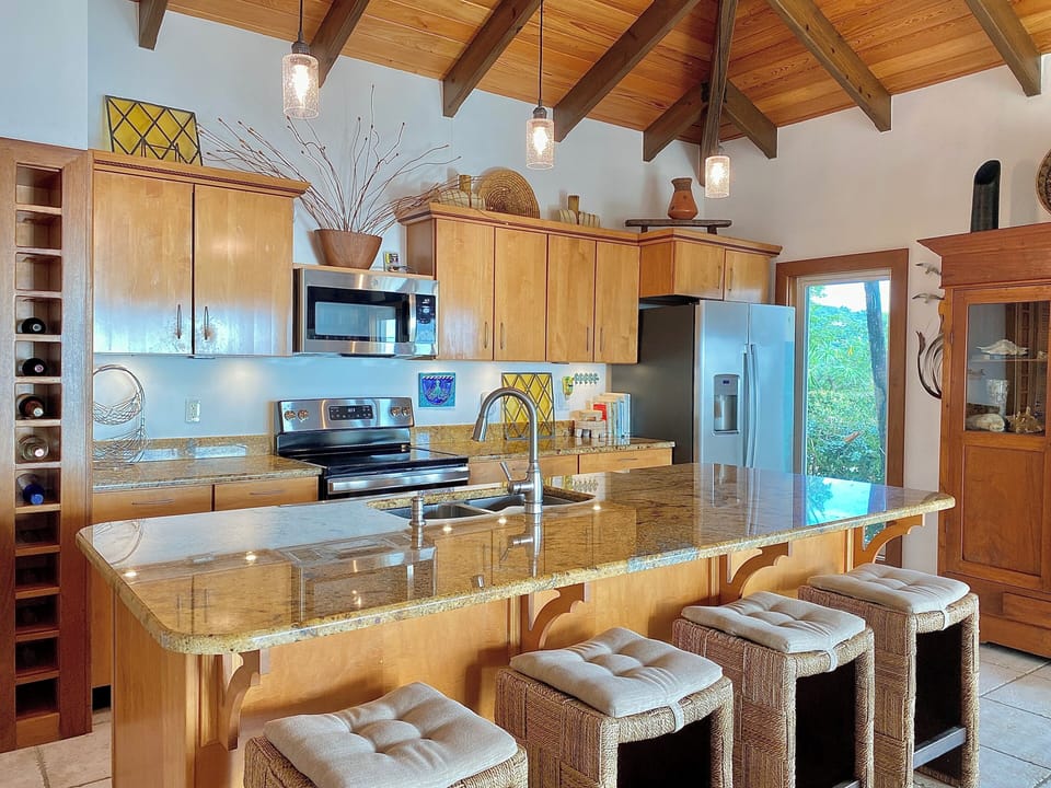Well stocked kitchen with stainless appliances