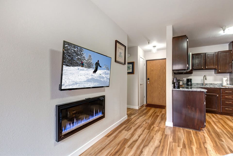 Vacation Rentals in Park City at Carriage House 320: Gas fireplace and HD TV