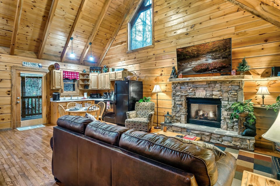 Living room with gas fireplace and smart TV