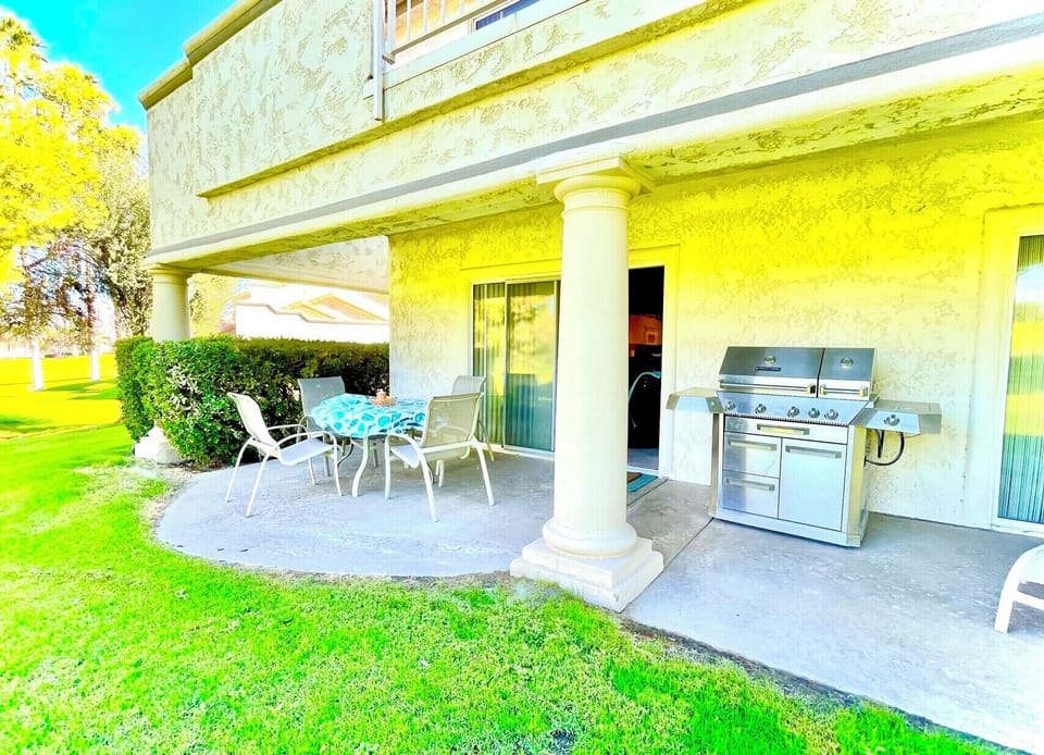 Patio pic #1 with 4 chairs and table. Patio doors off of living room.