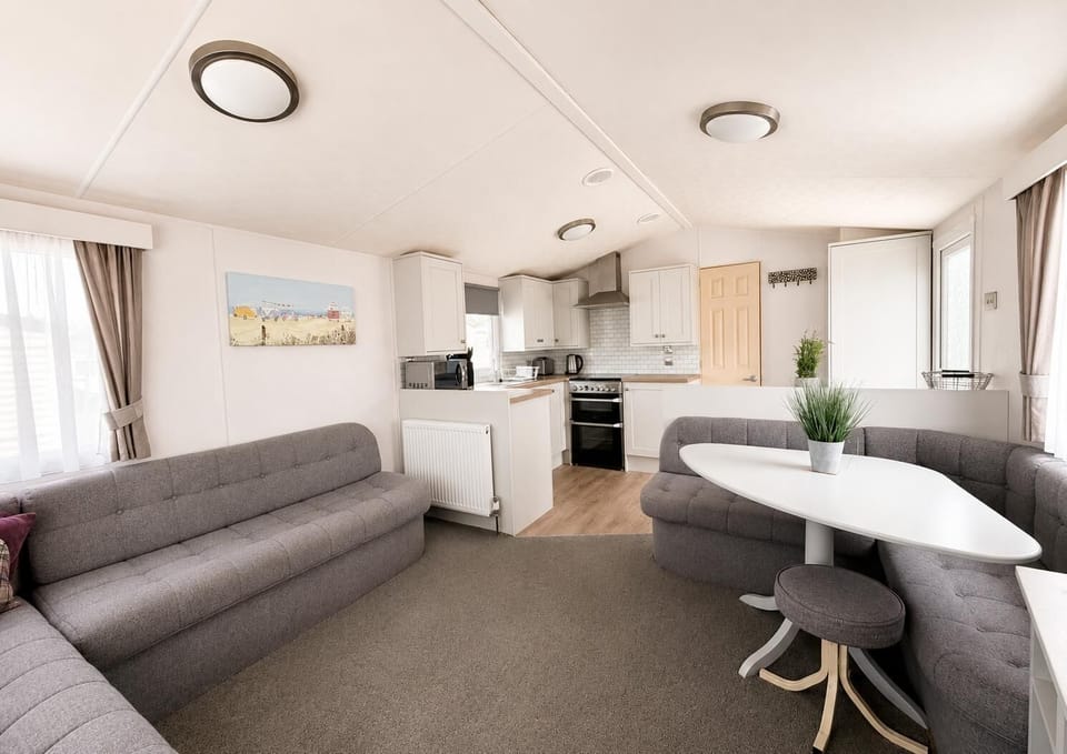 Whether you’re settling in for a movie night or sharing stories from your day out in Hunstanton, this inviting layout creates the perfect central hub for making memories