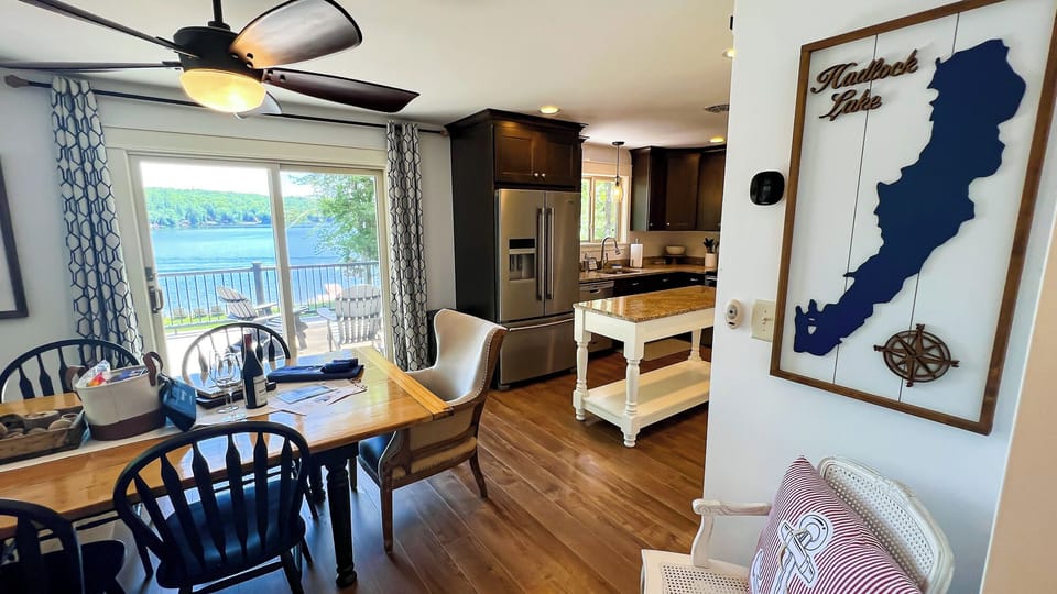 Dining table. Patio doors lead to the large deck. 