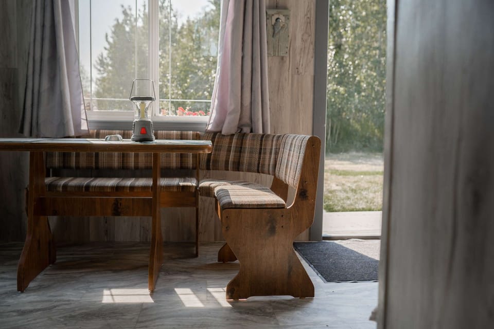 Dinette booth with a great view of birds and squirrels at the window feeder.