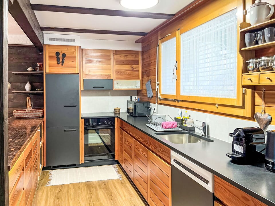 Kitchen, Countertop, Furniture, Cabinetry, Wood, Kitchen Appliance, Flooring, Interior Design, Major Appliance, Kitchen Sink