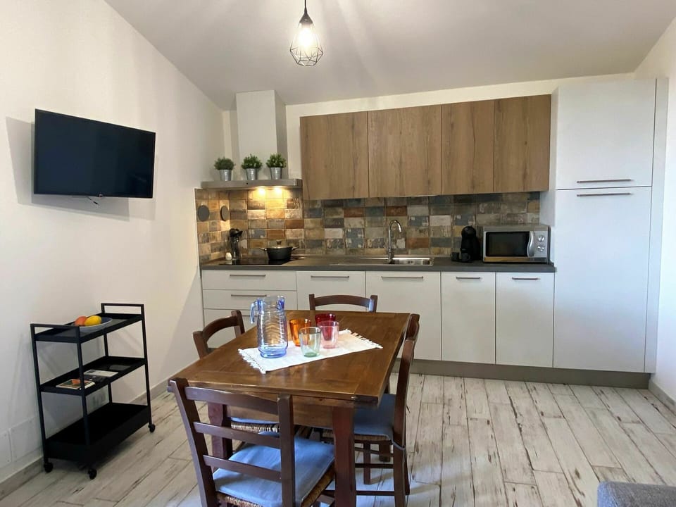 Furniture, Table, Cabinetry, Chair, Countertop, Wood, Interior Design, Floor, Flooring, Kitchen