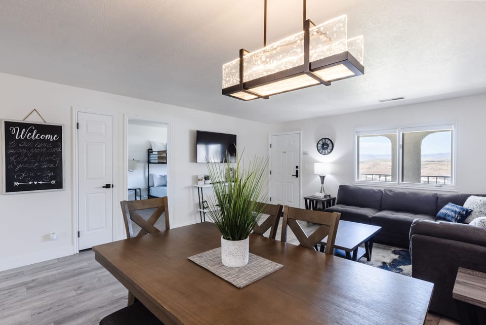 The dining table seats up to 6 and is open to the living area