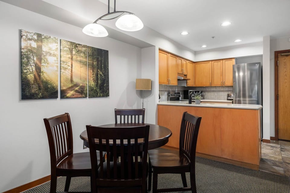 Enjoy meals together in the cozy dining area with seating for four.