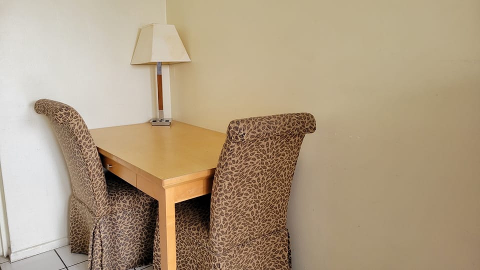 Desk with drawer/ moveable table
Comfortable chairs