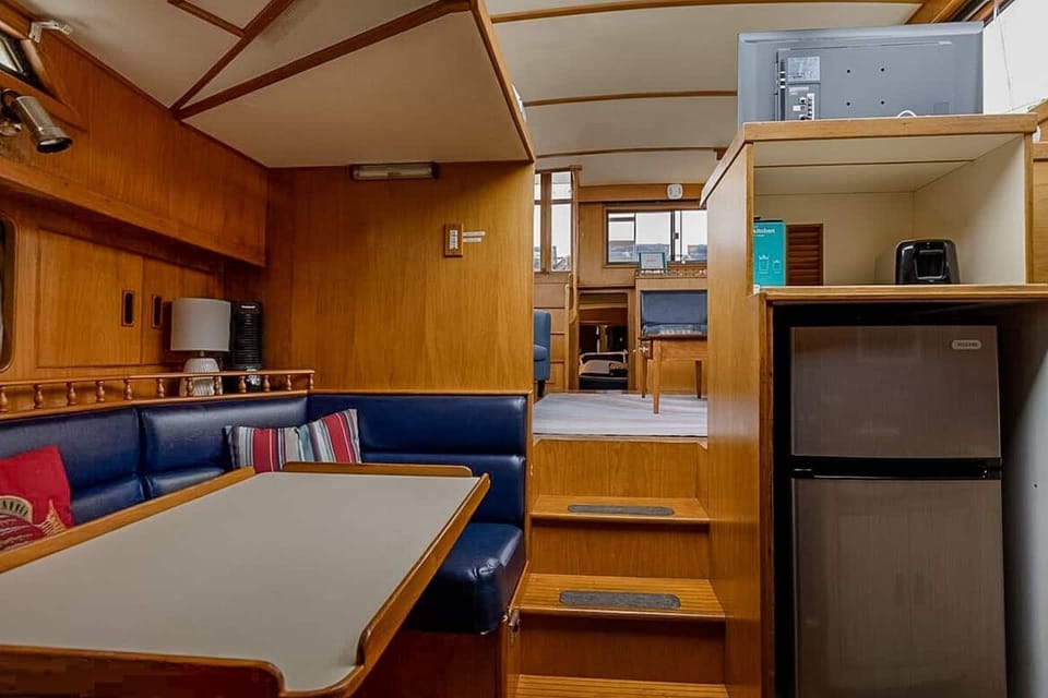 Hang out at the dinette while dinner is prepared in the galley. 