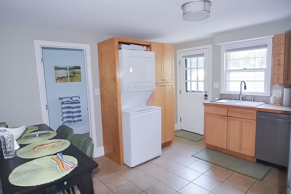 Kitchen door is main entrance to the unit 