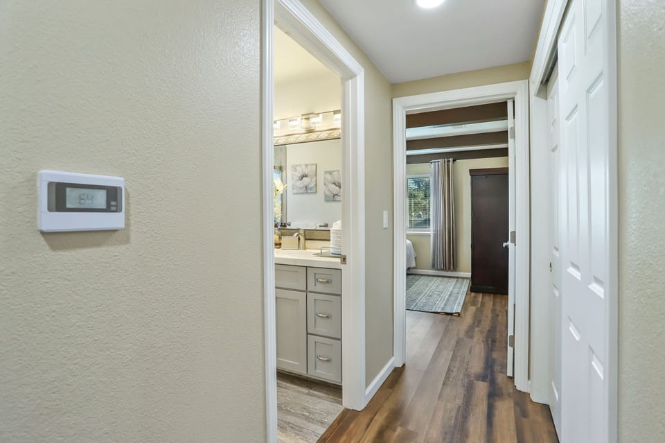 Hallway from bedroom #2, towards the guest bathroom and bedroom #3.