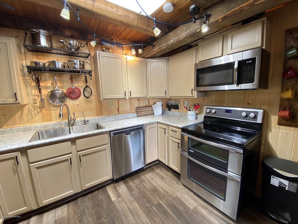 Fully furnished kitchen with gas range