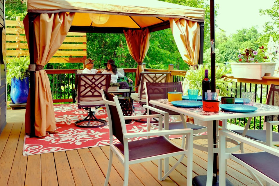 Huge back deck overlooking the creek perfect for relaxing and entertaining.