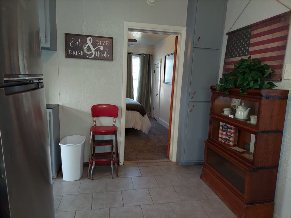 Kitchen has lots of storage and new refrigerator and stove.