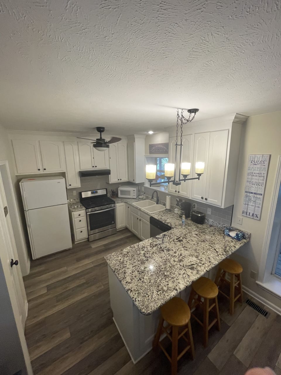 Kitchen spacious with good counter space, and amenitites.