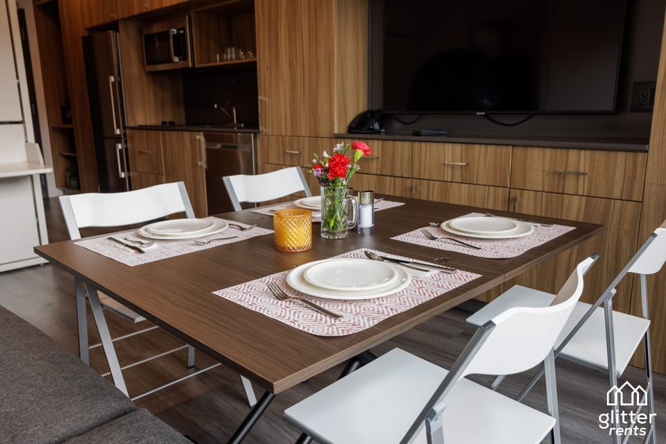 All YotelPad furniture in the condo is mindfully designed. The fold-out chairs are located in the closet by the entrance door. 