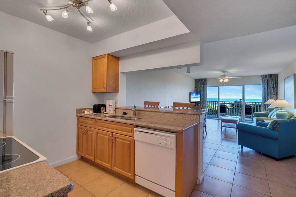 Stove, oven, microwave, refrigerator, dishwasher, toaster, blender, kettle, and coffee maker.