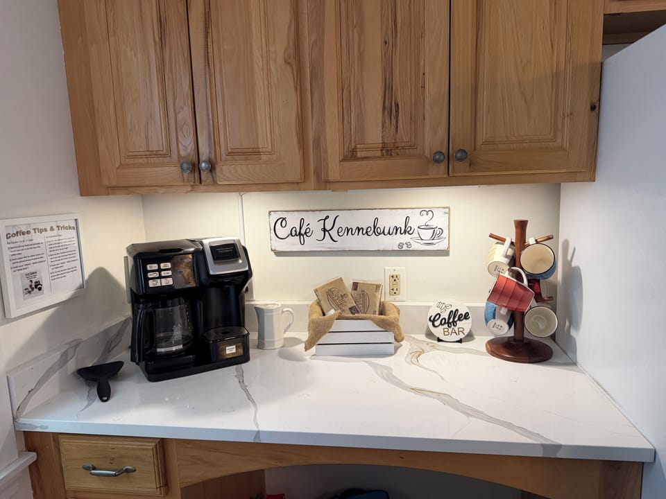 Coffee station with both brewed drip coffee or pods.