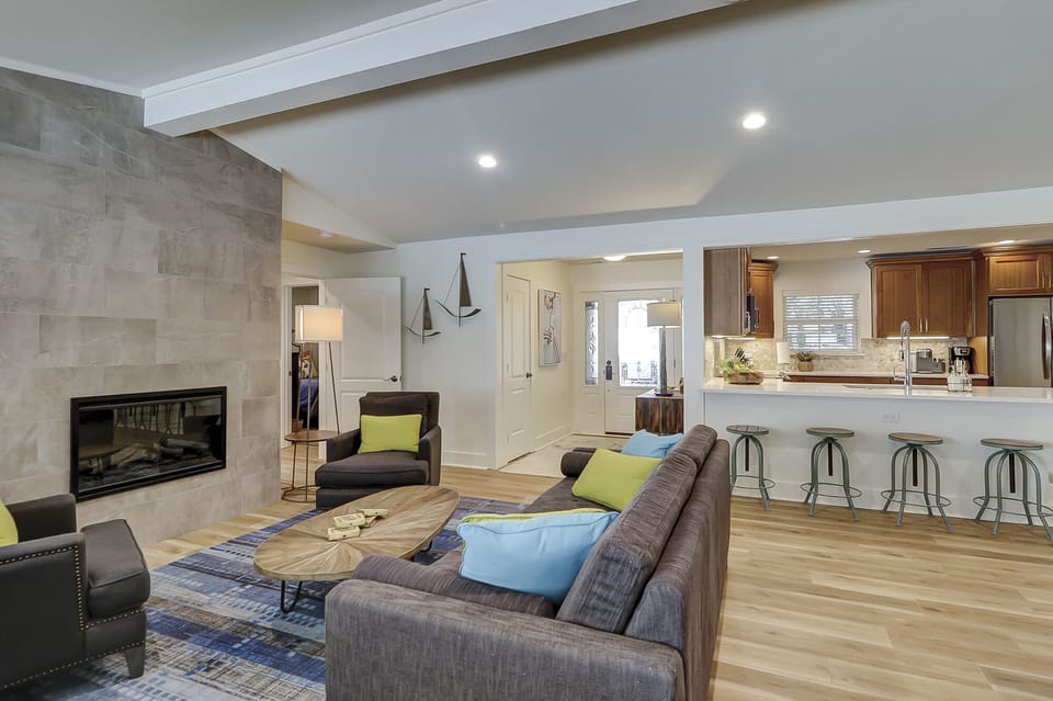 Additional view of conversation space and fireplace.