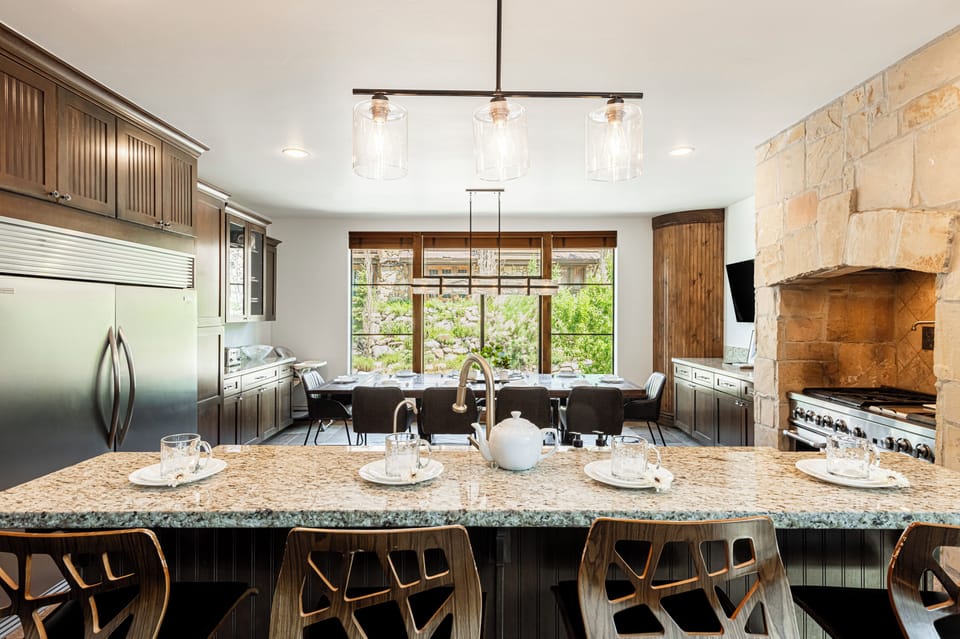 Kitchen island and an oversized SubZero fridge