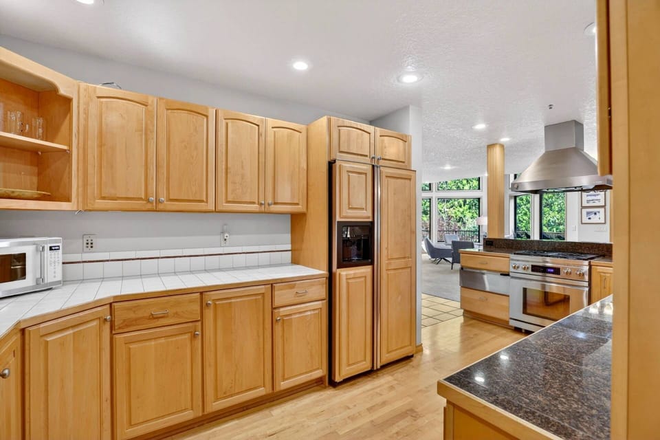 "Kitchen has ample storage space and a big stove top for making plenty of grand meals. The living areas were comfortable and had excellent views"-Ruth