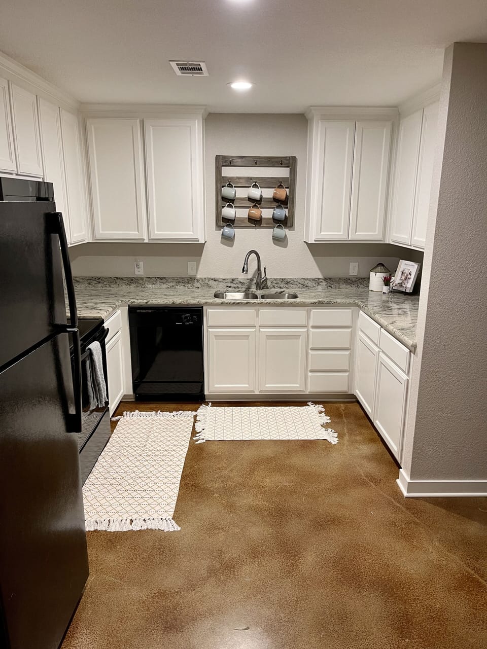 Full kitchen with pots, pans and service for 8.