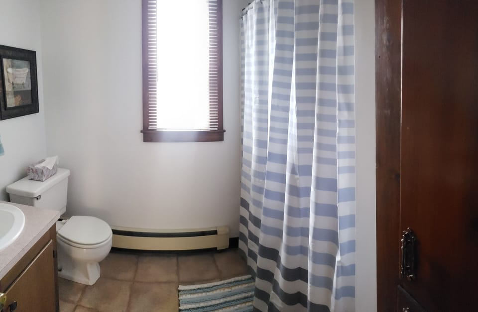 Bathroom with a tub/shower combo
