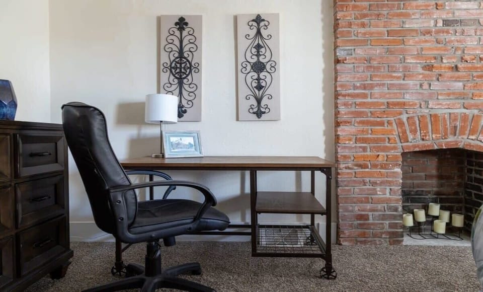 A desk space awaits in your first bedroom