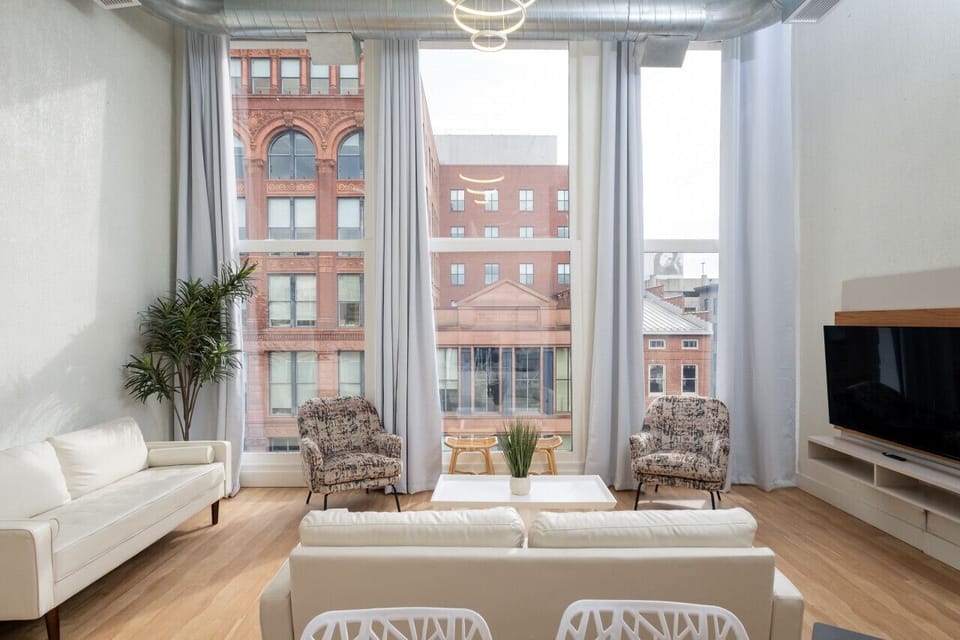 Comfortable lounging area with an open concept, lots of space and generous seating accommodations!