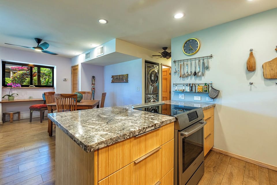 Gourmet kitchen loaded with useful tools and appliances. S.S. sink and faucet.