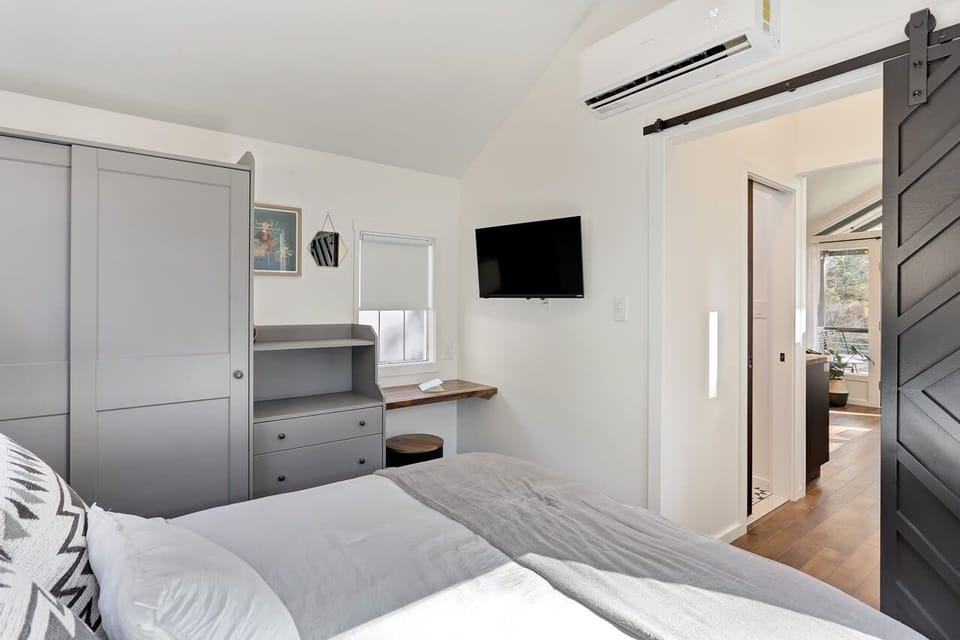 Bedroom Tv with beautiful sliding door