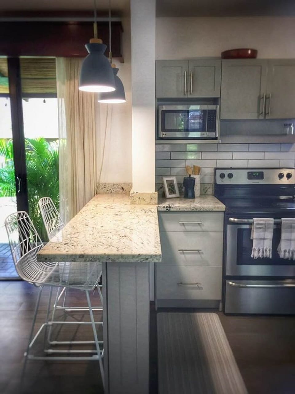 Our new peninsula with stools and pendant lighting. 