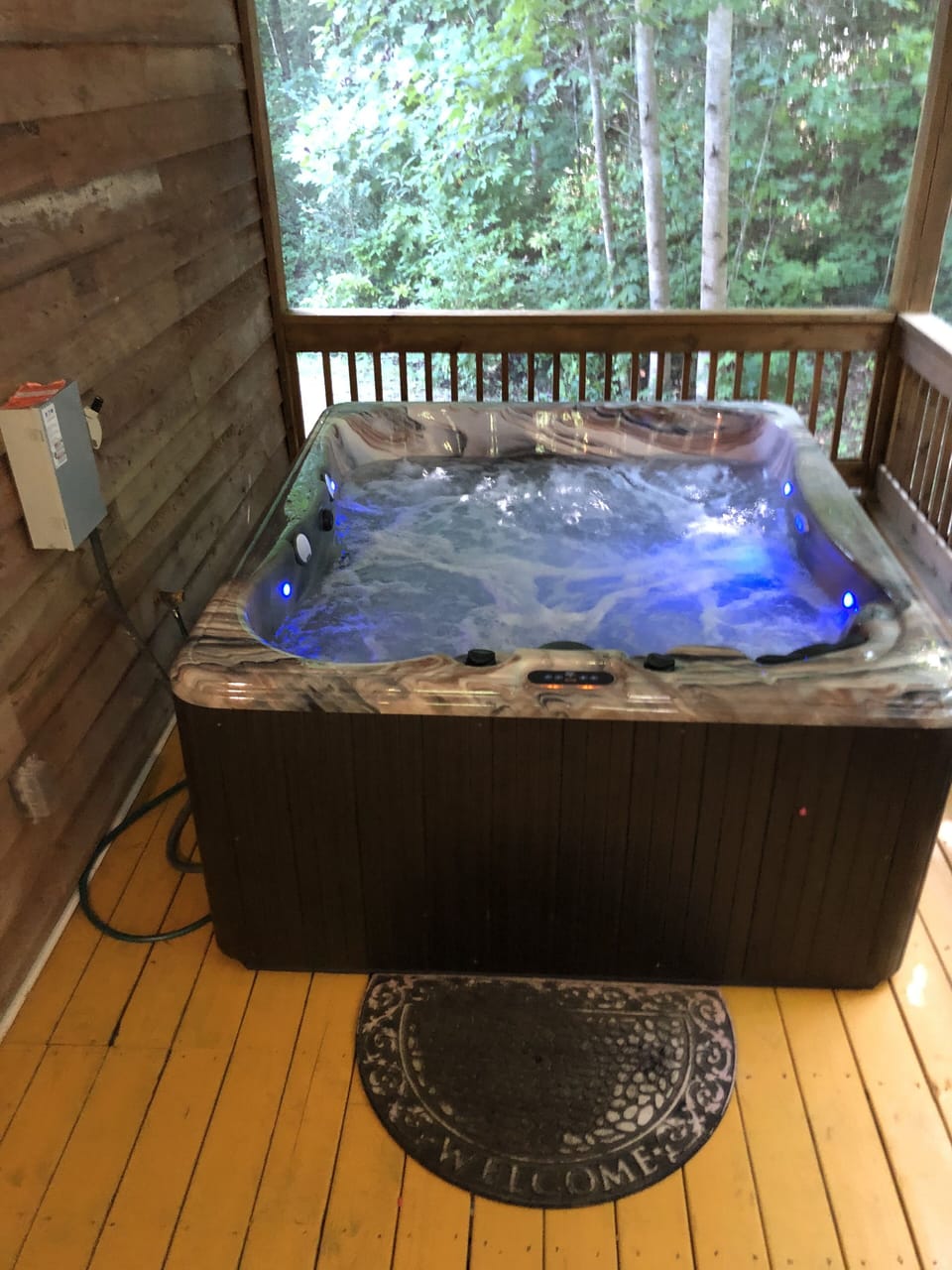 Super-nice hot tub with lighting and Bluetooth speakers.