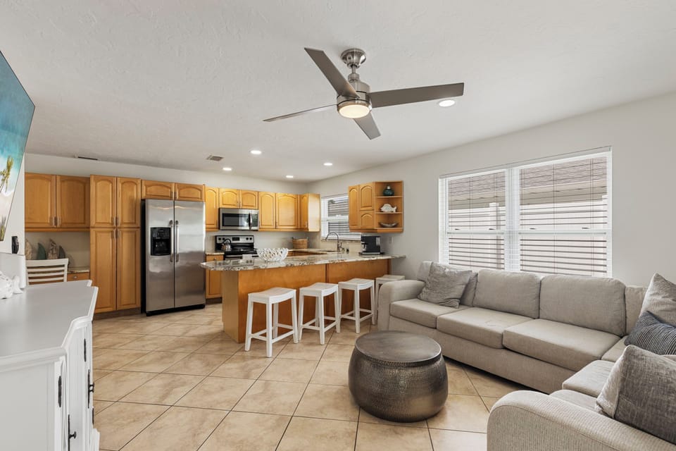 A bright, connected living/kitchen space so everyone can be together — from breakfast to bedtime