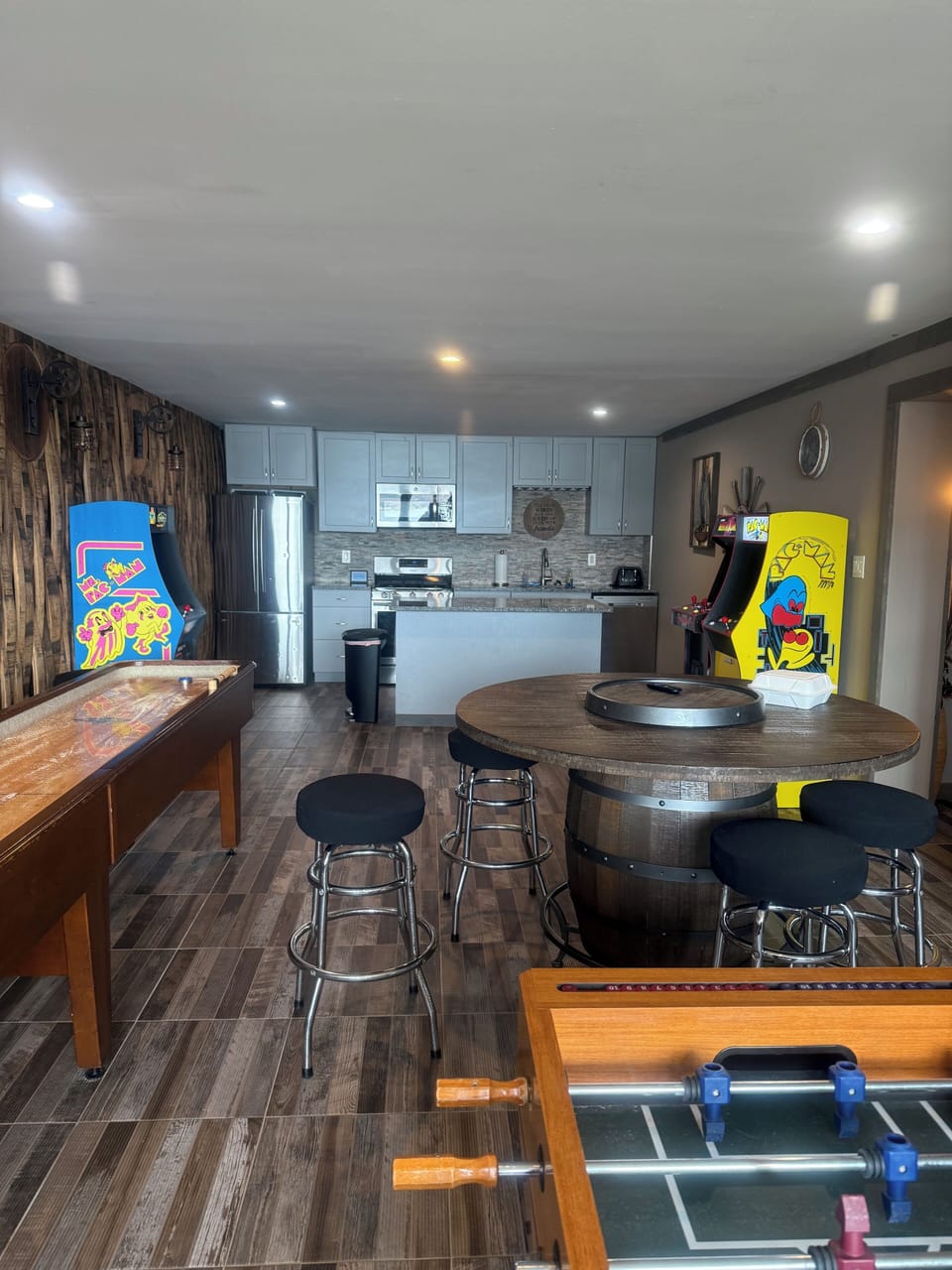 Amazing game room.  Shuffle board, video games, foosball.   No boredom here.