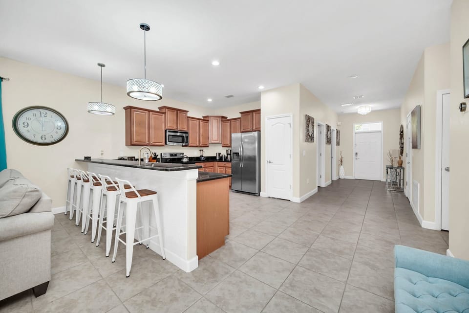 6 bar-stools at the island counter are perfect for breakfast on the go!