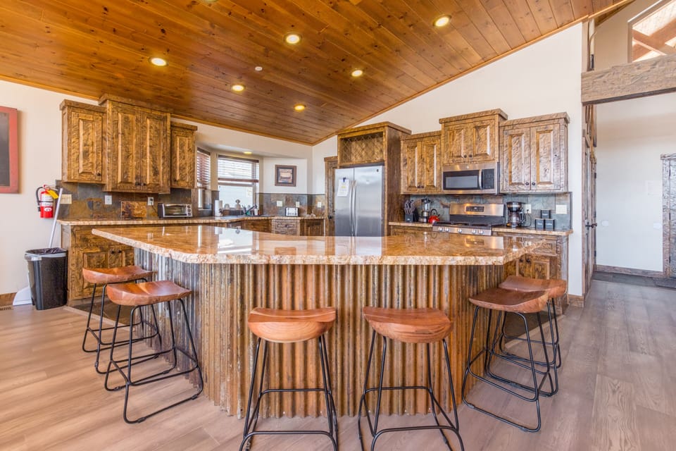 Additional barstool seating at the counter helps accommodate larger groups.