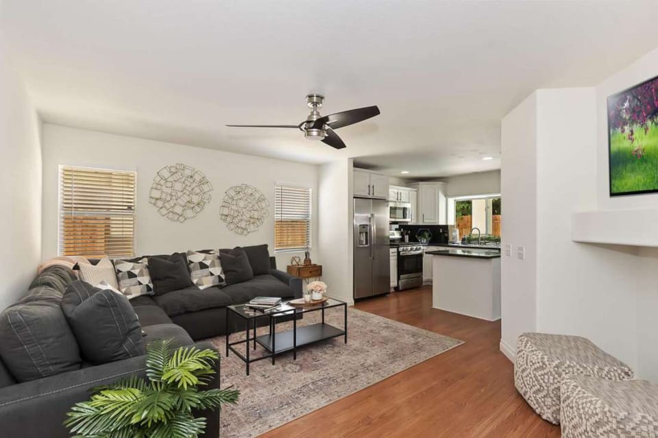 The living area offers plenty of comfy couch seating.