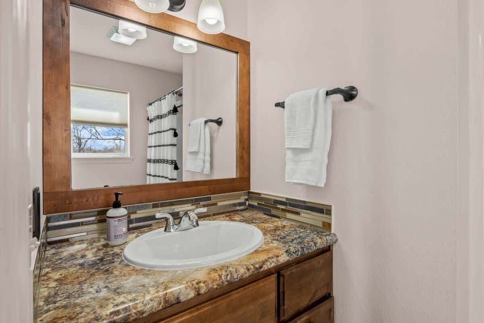 Two bathrooms provide plenty of room for everyone.