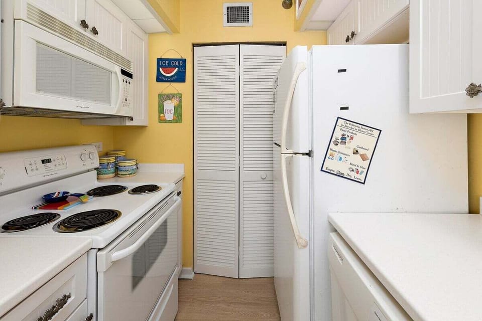 Beach Club 111 - Kitchen Area with Access to Laundry Area