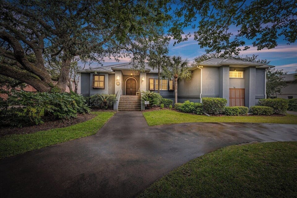 Front entrance with pathway and landscaping