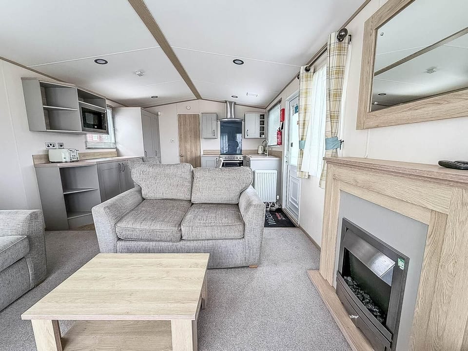 The caravan living area is perfect for quality time, board games, or simply putting your feet up with a cup of tea while recounting the day's adventures in Hunstanton.