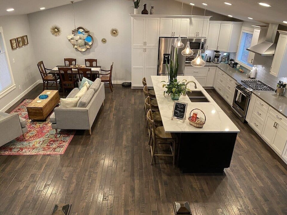 Main Floor is perfect for entertaining, relaxing and enjoying the space as a family or large group. It flows right into the back deck and has plenty of windows and light, for an open and airy feel. 