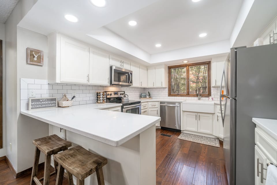 Kitchen bar area with seating for 2
